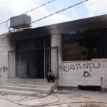 AA 20260726 42070561 42070557 GRAFFITI AND DAMAGE SEEN AT MOSQUE AFTER ISRAELI SETTLER RAID NEAR NABLUS e1785417743798